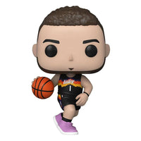 Funko POP! Devin Booker figure in a black Phoenix Suns City Edition jersey, dribbling a basketball.