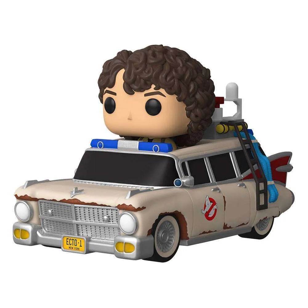 Funko POP! Trevor driving the weathered Ecto-1 vehicle from Ghostbusters: Afterlife in a detailed front-side view.