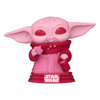 Front view of Grogu Valentine's Day Funko Pop in shades of pink and red, holding a heart-shaped cookie on a Star Wars base.