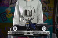 Iron Studios Batman The Animated Series 1/10 scale statue with Batmobile on a detailed base, front view.