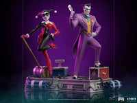 Iron Studios 1/10 scale Joker and Harley Quinn statues from Batman: The Animated Series on a themed base.