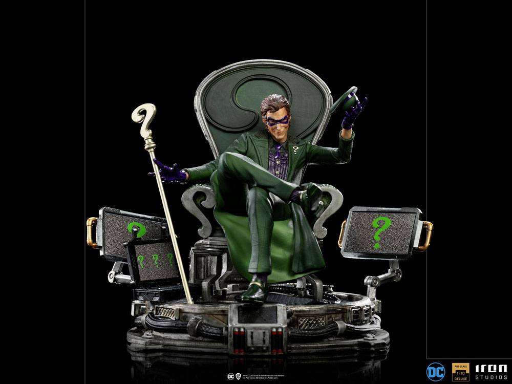Iron Studios 1/10 The Riddler statue in a green suit sitting on a question mark throne with monitors and cane.