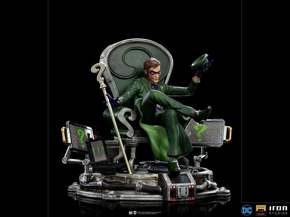 Iron Studios 1/10 The Riddler statue in a green suit sitting on a question mark throne with computer screens.