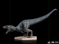 Side view of Iron Studios 1/10 scale Blue dinosaur statue from Jurassic World with detailed gray and blue scales.