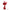 Iron Studios 1/10 Scarlet Witch statue in a red costume, floating above a ruined clock tower with magical energy effects.