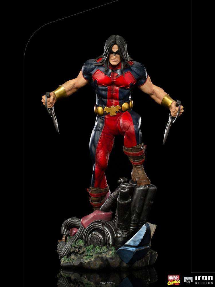 Iron Studios 1/10 Warpath statue featuring the X-Men hero in his red and blue suit, holding twin knives on a base.