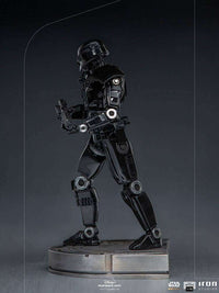 Side view of the Iron Studios 1/10 scale Dark Trooper statue, featuring a glossy black mechanical armor design.