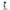 Iron Studios 14 cm Betty Rubble Art Scale statue in a blue dress, standing on a stone-textured base, side view.
