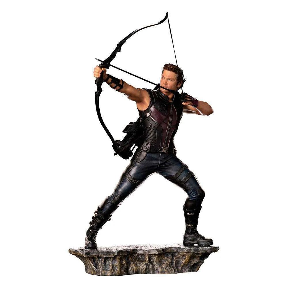 Iron Studios 1/10 Hawkeye Battle of NY statue in a dynamic archery pose on a rocky base, side view.