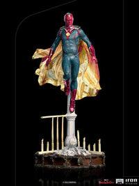 Iron Studios 1/10 Vision statue from WandaVision, featuring the hero floating above a ruined base with a flowing cape.